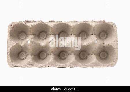 Rustic cartons made of biodegradable pressed fiber for storing ten eggs isolated on white background Stock Photo
