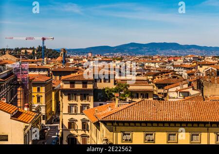 Gorgeous panoramic rooftop view of the historic centre of Florence with the street Via dei Pecori. The typical Tuscan cityscape seen from the famous... Stock Photo