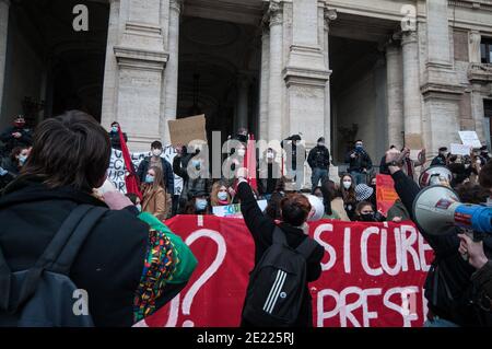 Student demonstrators shout slogans, display flags and a large banner during the protest.Students of some high schools in Rome staged a demonstration in front of the MIUR to demonstrate against the Italian Government and the Minister of Education Lucia Azzolina's decision of Distance Learning having postponed the return of students to their classes. Stock Photo