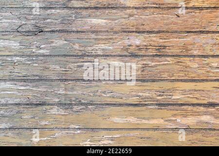 Old rustic wooden planks wall with peeling paint, grunge background or texture Stock Photo