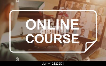 Unrecognizable young man typing on laptop, having online course Stock Photo