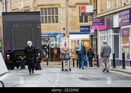 Yeovil, Somerset, UK.  11th January 2020.  Shoppers walking through the town centre at Yeovil in Somerset during the Covid-19 lockdown. Picture Credit: Graham Hunt/Alamy Live News Stock Photo