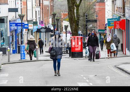 Yeovil, Somerset, UK.  11th January 2020.  Shoppers walking through the town centre at Yeovil in Somerset during the Covid-19 lockdown. Picture Credit: Graham Hunt/Alamy Live News Stock Photo