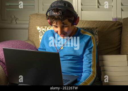 Teenage boy, age 13, on video call,UK Stock Photo