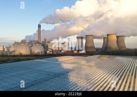 DRAX POWER STATION, YORKSHIRE, UK - JANUARY 7, 2021.  A landscape image of Drax Power Station pumping steam and smoke from its chimney and cooling tow Stock Photo