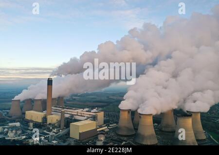 DRAX POWER STATION, YORKSHIRE, UK - JANUARY 7, 2021.  An aerial landscape image of Drax Coal Fired Power Station pumping steam and smoke from its chim Stock Photo