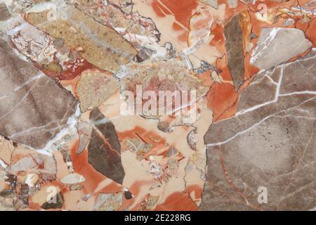 Variegated stone in gray, white and brown colors marble texture background Stock Photo