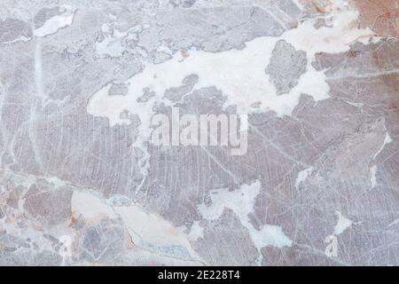 Variegated gray stone texture background with scratches Stock Photo