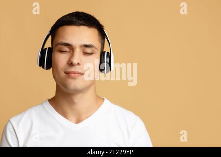 Spare time, meditation, relaxation and rest with music staying at home during covid-19 quarantine Stock Photo