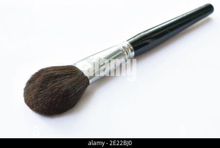 cheek brush with black handle on white background Stock Photo