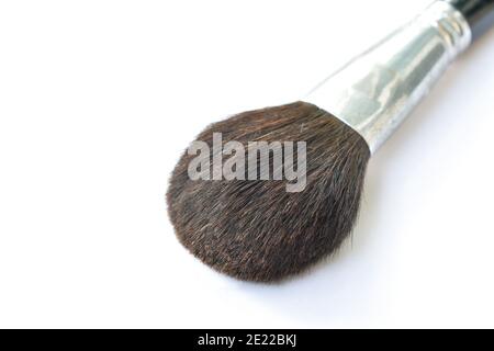 cheek brush with black handle on white background Stock Photo