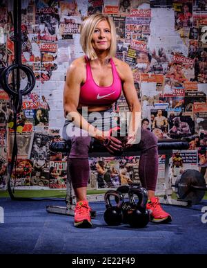 Lifestyle transformation coach and body builder Jo Morrison at her training gym in Hove, East Sussex, UK Stock Photo