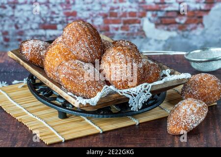 Traditional Madeleines cakes dusted with icing sugar Stock Photo