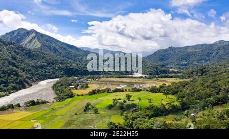 Cordillera on Luzon Island, Philippines, aerial view. Mountain landscape with rice fields. Mountains and a beautiful valley with rice terraces. Stock Photo