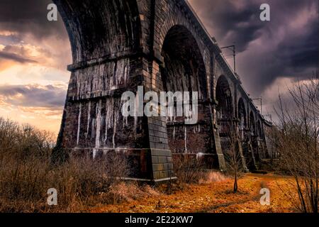 The Sankey Viaduct is a railway viaduct in North West England. It is a designated Grade I listed building and has been described as being 'the earlies Stock Photo