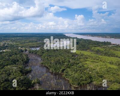 Aerial drone view of Madeira river, igapo igarape lake, Amazon rainforest landscape in Rondonia, Brazil. Concept of  ecology, deforestation. Stock Photo