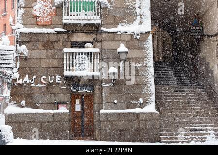 Spain, Madrid; January 9 2021: Snow storm 'Filomena' in the Madrid down town, Square Mayor, Street De Los Cuchilleros, Las Cuevas De Luis Candelas Stock Photo