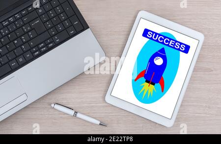 Success concept shown on a digital tablet Stock Photo