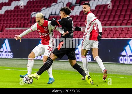 Lisbon, Portugal. 23rd Feb, 2022. Noussair Mazraoui (L) and Antony dos  Santos (R) of Ajax celebrate after scoring a goal during the UEFA Champions  League match between SL Benfica and AFC Ajax