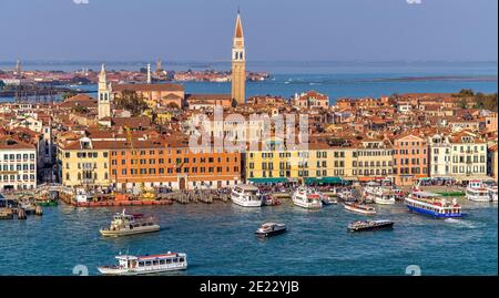 Venice Waterfront - Aerial panoramic view of the busy and crowded waterfront of the Sestiere of Castello on a sunny October afternoon. Venice, Italy. Stock Photo