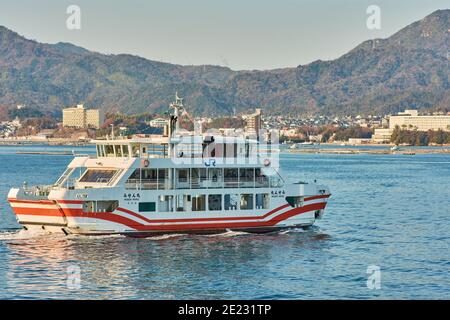 Hiroshima Prefecture, Japan - December 21, 2017: Misen Maru passenger boat taking tourists to the Itsukushima Shinto Shrine on Miyajima island in the Stock Photo