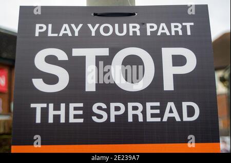 Old Amersham, Buckinghamshire, UK. 11th January, 2021. A Play your Part, Stop the Spread sign. Amersham Old Town was very quiet today as many people heed the Government requirement to stay at home during the latest Covid-19 lockdown. Credit: Maureen McLean/Alamy Stock Photo