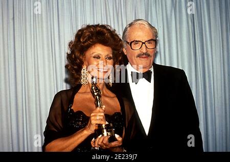 Sophia Loren and Gregory Peck at the 63rd Academy Awards ceremony on ...