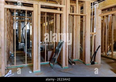 Interior industrial steel pipelines, valves and cover for unfinished basement under construction Stock Photo