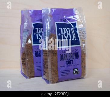 LIVERPOOL, UK - CIRCA DECEMBER 2020: Packet of Tate Lyle fairtrade dark brown soft pure cane sugar Stock Photo