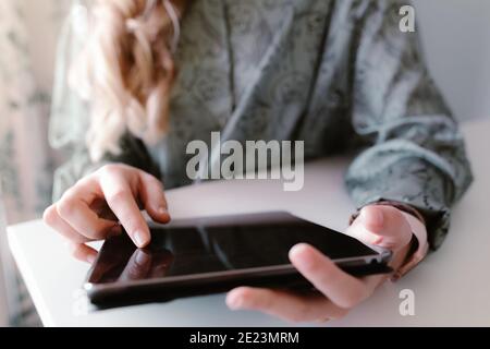 Young woman using digital tablet Stock Photo