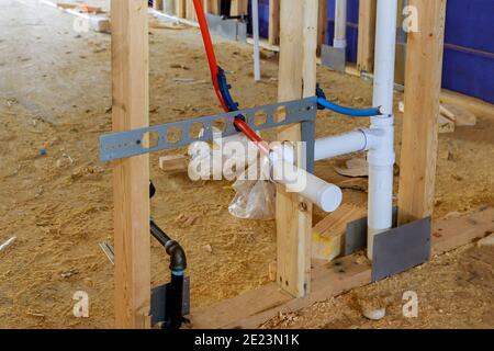 Wood framework of under construction laundry room in a new home house beam framing Stock Photo