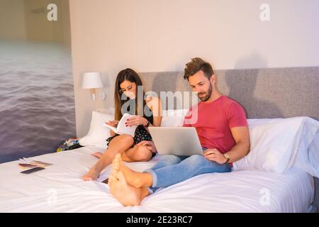 Young loving couple resting in the hotel room Stock Photo