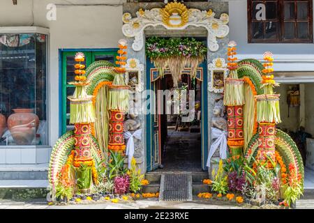 Balinese Hindu wedding gates decorated with sarad, colorful rice flour mixture. Bali, Indonesia. Stock Photo