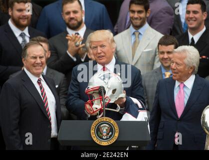 https://l450v.alamy.com/450v/2e242en/file-photo-dated-april-19-2017-of-president-donald-trump-is-presented-a-new-england-patriots-helmet-by-coach-bill-belichick-left-next-to-owner-robert-kraft-right-as-he-welcomes-the-super-bowl-champions-to-the-white-house-in-washington-dc-usa-new-england-patriots-coach-bill-belichick-said-in-a-statement-monday-that-he-had-turned-down-the-opportunity-to-receive-the-presidential-medal-of-freedom-from-president-trump-because-of-the-tragic-events-of-last-week-a-reference-to-the-rampage-at-the-capitol-in-a-statement-belichick-said-he-was-flattered-to-be-nominated-for-the-award-the-high-2e242en.jpg