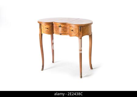 elegant little table with inlay and drawers on the white background Stock Photo