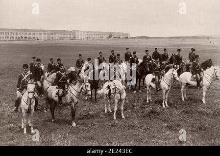 Officers of a regiment of lancers, on horseback in field in front of barracks. Turkey (Ottoman Empire). Istanbul, end of the 19th century. Stock Photo