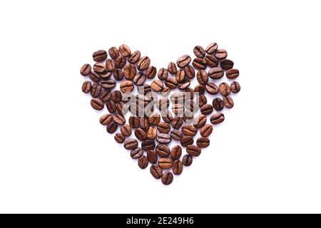 Nice heart from coffee beans isolated on white background. Stock Photo
