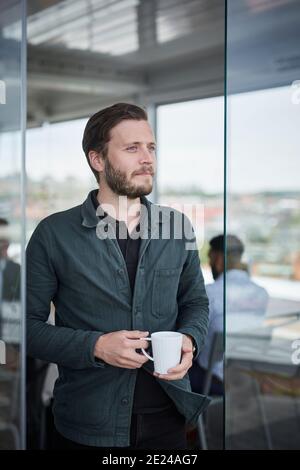 Businessman having coffee break Stock Photo