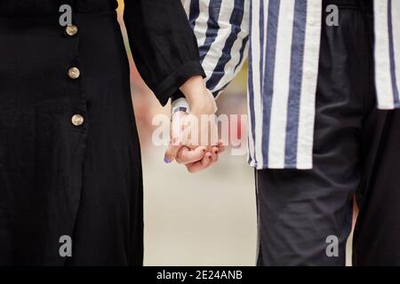 Couple holding hands Stock Photo