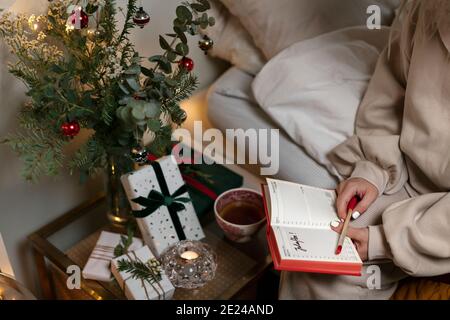 Womans hands holding diary Stock Photo