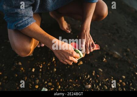 Womans hands washing cutlery Stock Photo