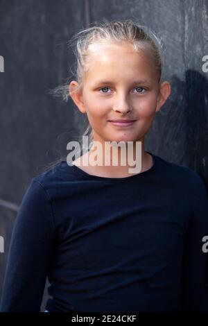 Portrait of teenager girl looking at camera on white background Stock ...