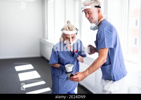 Doctors wearing personal protective equipment Stock Photo