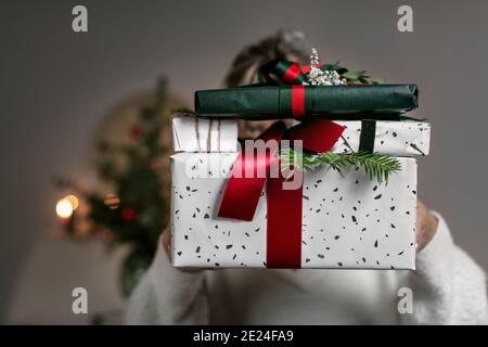 Hands holding Christmas present Stock Photo