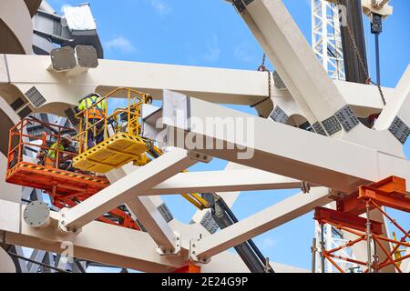 Workers on a construction site. Engineering and architectural workplace. Stock Photo