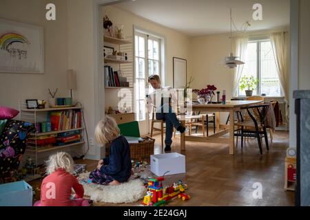 Father with daughters at home Stock Photo