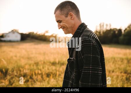 Smiling man looking away Stock Photo