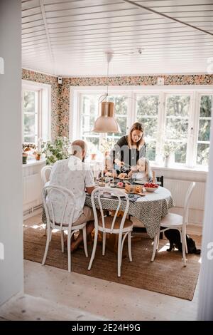 Family having meal together Stock Photo
