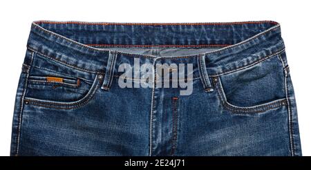 Front pockets, waist area, zipper, and its button of dark blue jeans isolated on white background. Close up shot. Clothing concept. Stock Photo