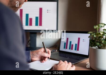 Mid section of man working from home Stock Photo